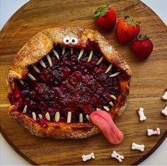 a piece of food with teeth and eyes on it