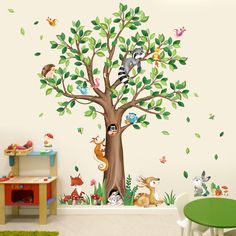 a tree with animals and leaves on it