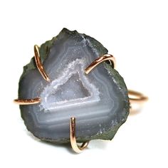 This chunky geode ring has a pretty grey and blue pattern. The naturally beautiful stone is set in an adjustable gold filled setting. This adjustable ring is best for sizes between 5 and 8. Love! xoxoxo payton For more cool jewelry looks, check out http://www.etsy.com/shop/FizzCandy All FizzCandy creations come beautifully wrapped in a colorful canvas bag which is tied with a bright ribbon. Please see our store policies here - https://www.etsy.com/shop/FizzCandy/policy?ref=shopinfo_policies_left Unique Adjustable Raw Stone Jewelry, Adjustable Agate Open Ring Jewelry, Adjustable Agate Jewelry With Raw Stone, Adjustable Agate Open Ring, Adjustable Agate Crystal Ring With Gemstone, Adjustable Agate Gemstone Rings, Adjustable Raw Stone Crystal Ring For Healing, Agate Jewelry With Natural Stones In Open Ring Shape, Crystal Jewelry Ideas