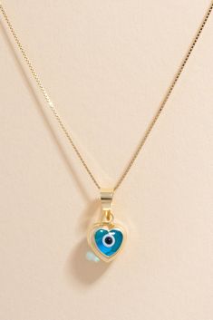 Embrace Love and Protection with our Exquisite Evil Eye Heart Pendant in 14K Solid Gold. Crafted to embody love, friendship, and ward off negative energies, our Evil Eye Heart Pendant is meticulously designed in pure 14K gold at our Los Angeles workshop. Each order arrives impeccably packaged, presenting your pendant in an elegant box for an exceptional unboxing experience. For added elegance, explore our collection of solid gold chains, available as an option to complement your pendant. Approxi Jewelry Evil Eye, Handmade Evil Eye, Love And Friendship, Solid Gold Chains, Minimal Jewelry, Eye Pendant, Evil Eye Pendant, Evil Eye Charm, Eye Jewelry