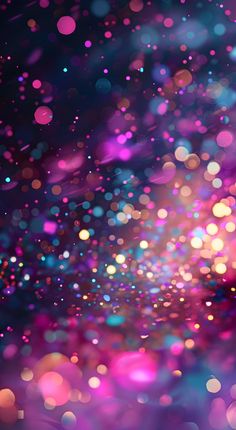 an abstract background with blurry lights in pink, blue and purple colors is shown