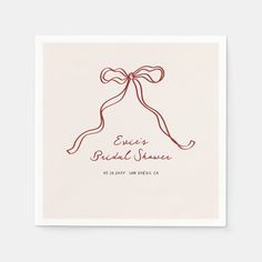 a white card with red ribbon on it that says, enjoy bride's shower