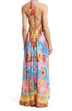 Unleash your free boho spirit in this longline halter cover-up dress styled with vivid allover blooms and tassel accents. Halter neck Tassel accents Tie closure All-over print Woven 100% polyester Hand wash cold, line dry Imported Model stats: 5'10", 32" bust, 25" waist, 36" hip. Model is wearing size S. Multicolor Halter Neck Maxi Dress For Beach Season, Spring Beach Maxi Dress In Multicolor Print, Colorful Bohemian Maxi Dress For Summer, Colorful Floral Print Beach Dress, Bohemian Multicolor Print Dress For Beach Party, Multicolor Bohemian Dresses For Summer Parties, Bohemian Multicolor Dress For Summer Parties, Tropical Multicolor Halter Neck Maxi Dress, Colorful Beach Cover-up Dress For Spring