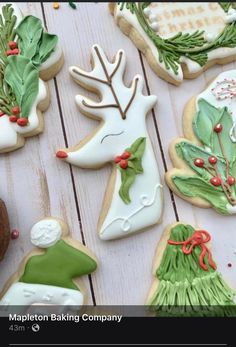 decorated christmas cookies on a wooden table