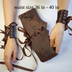 Beautiful cuffs bracelet and corset belt for an added embellishment to your outfit. Make any outfit look stylish! Perfect pieces for an alternative or Gothic wedding, cosplay, medieval, prom.  Includes corset belt and wrist cuffs.  The sizes in this listing: 35 - 40 inches. Link to corset belt and cuff bracelet sizes: 26 inches - 30 inches - https://jinesadesign.etsy.com/listing/1386757050/ 31 inches - 35 inches -https://www.etsy.com/listing/1740652186/ Detachable cuffs included 2 pcs.  Cuff wid Bracelet Wrist Tattoo, Detachable Cuffs, Bracelets Vintage, Wrist Bracelet, Steampunk Diy, Gothic Corset, Corset Belt, Gothic Wedding, Wrist Cuffs