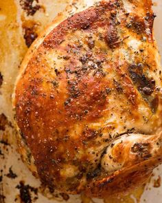 a close up of a chicken on a pan