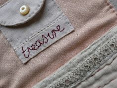 there is a small patch on the back of a shirt that says, please me