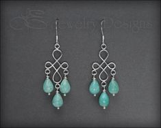 • MADE TO ORDER - please allow for production time • MATERIALS: sterling silver, Amazonite ITEM DETAILS :These gorgeous earrings are just stunning! I have made the entire earrings from sterling silver and Amazonite briolettes. They hang from sterling silver ear wires and come with rubber backs for extra security. MEASUREMENTS: • length from top of earwire to bottom of earrings: ~55mm (2")**************************************** All designs and photos © LE JEWELRY DESIGNS FACEBOOK & INSTAGRAM Nickel Free Briolette Teardrop Earrings In Sterling Silver, Nickel-free Briolette Teardrop Sterling Silver Earrings, Hypoallergenic Sterling Silver Chandelier Drop Earrings, Sterling Silver Briolette Earrings, Pierced Sterling Silver Briolette Earrings, Handmade Sterling Silver Teardrop Chandelier Earrings, Handmade Teardrop Sterling Silver Chandelier Earrings, Silver Briolette Earrings, Pierced, Silver Teardrop Wire Wrapped Chandelier Earrings