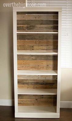 a bookcase made out of wooden planks