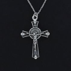 .¸¸.*'.¸¸.*'.¸ Charm is made out of lead free pewter. Dimensions 42mm X 29mm (1-5/8" X 1-1/8") Large Crucifix cross charm comes on your choice of 18-, 20-, 24-inch or 18-20 inch adjustable cable chain.  Please select desired length from drop-down menu during checkout. Appropriate size for a man. If you would like only the charm without the chain, the price is the same because the chain is included at no charge. Just let me know if you don't need it. Each item comes in a colorful organza bag. Crucifix Necklace, Cross Charms, Silver Cross, Organza Bags, Men Necklace, Cross Necklace, Charm Necklace, Mens Jewelry, Jewelry Necklaces