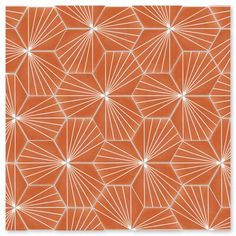 an orange and white geometric pattern with lines in the middle, on a plain background