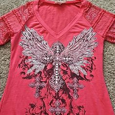 Angels And Diamonds Rhinestone Cross Shirt! Lace Material Sleeves! V Neck! Unique Sexy Shirt! Never Worn! Excellent Condition Pink Fitted Tops With Rhinestones, Fitted Pink Tops With Rhinestones, Spring Pink Rhinestone Tops, Casual Pink Tops With Rhinestones, Fitted V-neck Top With Rhinestones, Summer Pink Tops With Rhinestones, Cross Shirt, American Eagle Shirt, Cross Shirts