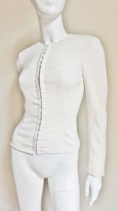 For Sale on 1stDibs - An incredible off white silk jacket from Gianni Versace Couture. It is a simple fitted, long sleeve jacket closing with large hooks corset style from the Fitted Long Sleeve, Versace Couture, Simple Fits, Silk Lace, Long Sleeve Jacket, Silk Jacket, Sleeve Jacket, Gianni Versace, Corset Style