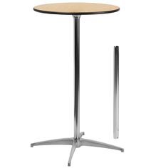 a round table with a metal base and a wooden top on an isolated white background