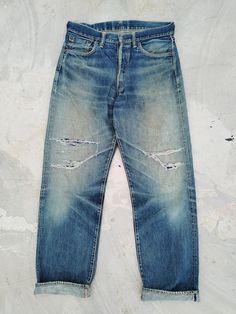 Evisu Selvedge Jeans Early period model Made in Japan Nicely faded from raw denim ACTUAL MEASUREMENT (Inch) Waist 16.5 Outseam 43 Inseam 32.5 Leg Opening 9 Rise 13 Thigh 13 CN675 NOTE 1) All items are 100% authentic. 2) All items should be WASHED before use. 3) Do not rely on tag size as pre-worn items may have been altered, stretched or shrunk. 4) The best way to ensure a correct fit is to compare our measurements with the measurements of a similar item that you know fits you well. 5) Please refer all images, and enlarge them for better details. 6) All measurements are been taken with the garment flat on the floor. 7) NO RETURN NO REFUND AFTER PURCHASE. 8) Please do not expect it to be like new as mostly are used item, unless mentioned as NEW. 9) Actual item might have color difference wi Faded Selvedge Jeans For Streetwear, Evisu Jeans, Denim Flats, Selvedge Denim, Raw Denim, Distressed Jeans, Favorite Jeans, Mens Jeans, Like New