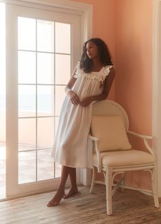 A family business, If Only If is obsessed with the classic nightgown from its timeless silhouette to the most special details. Crafted in 100% natural materials, these nightdresses are romantic, practical, and become even softer with every wash. Hanging in straight pleats from the ruffled neckline, the Sands Silk Nightdress is simple elegance at its absolute finest that should be worn to bed or cocktail hour and anywhere in between. Product Details Silk satin. Care Instructions Machine wash warm Chic Sleeveless Nightgown For Loungewear, Elegant Summer Nightgown For Lounging, Elegant Summer Lounging Nightgown, Elegant Relaxed Fit Dress For Loungewear, Elegant Sleeveless Nightgown For Home, Elegant Spring Nightgown For Lounging, Feminine Spring Lounging Dresses, Elegant Nightgown For Lounging, Elegant Ruffled Nightgown For Sleep