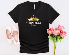 Embrace your royal essence with our 'Ohemmaa Akan Queen T-Shirt.' Perfect as a birthday, mother, wife, or gift for her, this shirt celebrates the strength and beauty of African heritage. Designed for individuals with African roots, it symbolizes black excellence and Ghanaian pride. With its premium quality and free shipping, it's an ideal choice. Claim your 'Ohemmaa Queen T-Shirt' today and let your majestic spirit shine! This t-shirt is everything you've dreamed of and more. It feels soft and l Queen T Shirt Design, Queen Tshirt Band, Queen Band T Shirt, Royal Essence, Black Queen Shirts, Queen Shirt, Birthday Mother, African Heritage, Inspirational Tshirts