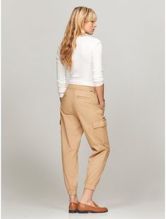 Tommy Hilfiger women's pant. Made from soft stretch cotton, these comfy high-waist joggers with a utility feel feature an elastic drawstring waist and sporty elastic cuffs. Easily dressed up or dressed down, this versatile pair is ideal for travel and also can be worn to the office. Side pockets, back welt pocket and handy cargo pockets at the legs add functionality to the flattering form.  Material: 98% Cotton, 2% Elastane. Casual Cargo Pants, Cargo Joggers, Tommy Hilfiger Women, Dressed Down, Welt Pocket, Stretch Cotton, Cargo Pants, Drawstring Waist, The Office