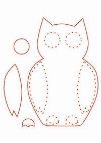 an owl is cut out from the paper