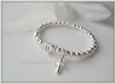 Heart Initial and Cross All Sterling Silver Baptism Bracelet Silver Bracelet For Baptism Mother's Day, Personalized Silver Name Bracelet For Baptism, Adjustable Silver Name Bracelet For Baptism, Silver Spiritual Bracelets For First Communion, Silver Spiritual Bracelet For First Communion, Personalized Adjustable Silver Rosary Bracelet, Silver Spiritual Bracelets For Baptism, Silver Spiritual Bracelet For Baptism, Spiritual Silver Bracelets For Baptism