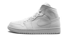 The Air Jordan 1 Mid “Triple White” removes any trace of color for an ultra wearable rendition of Michael Jordan’s first signature shoe. Lowered down to mid-top form, this Jordan 1 “Triple White” features soft white leather across the entire upper. Tonal details like the Swoosh on each side and a classic Wings logo on the collar add subtle styling. Additional design elements include a white nylon tongue tab with Jumpman branding and a perforated toe that allows for constant airflow to the foot. Jordan 1 Mid Triple White, Mid Sneakers, Wings Logo, Swoosh Logo, Mid Top, Air Jordan 1 Mid, Jordan 1 Mid, Black & White, Basketball Players