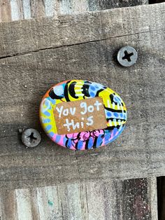 there is a button that says you got this on the side of a wooden door