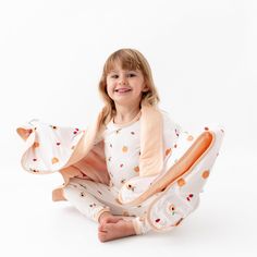 Our toddler pajama sets are breathable, super soft, and wildly comfy. Each set comes with a long-sleeved top and matching pants made with luxurious, eco-friendly viscose from bamboo fabric for all-over comfort without the negative environmental impact. Wash before first use Machine wash cold, gentle cycle Tumble dry low Iron low if desired Do not bleach 95% Viscose from bamboo, 5% Spandex No tag for extra comfort Watermelon Whale, Diaper Caddy, Toddler Pajamas, Soft Baby Blankets, Gentle Touch, Sleep Sacks, Matching Pants, Security Blanket, Hooded Towel