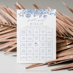 a white and blue wedding game with flowers on it