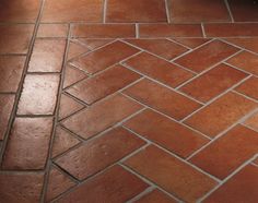 an orange brick floor with green lines on it