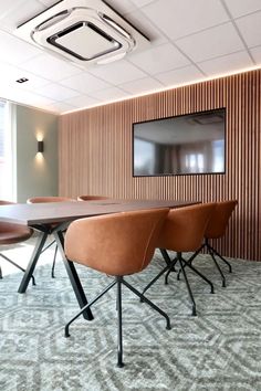 a conference room with chairs and a table