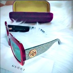 Gucci Gg0102s (Blonde Havana/Silver Glitter) Sunglasses New * Strong Acetate Frames And Temples With Sparkling Accents. * Smooth Plastic Lenses Offer 100% Uva/Uvb Protection. * Integrated Nose Guards. * Double G Brand Name Hardware At Temples. * Most Complementary Face Shapes: Oval, Round. * Protective Hard Case Included. * Made In Italy. * Measurements: * Eye Size: 54 Mm * Bridge: 25 Mm * Temple Size: 145 Mm * Weight: 2.4 Oz Please Keep In Mind Before Demanding An Exorbitant Discount, That Poshmark Charges Us A Fee Of 20% Of The Price Of Each Sale. Glitter Sunglasses, Gucci Cat Eye Sunglasses, Black Gold Sunglasses, Polaroid Sunglasses, Red Sunglasses, Rimless Sunglasses, Black Sandals Heels, Gucci Sunglasses, Luxury Sunglasses