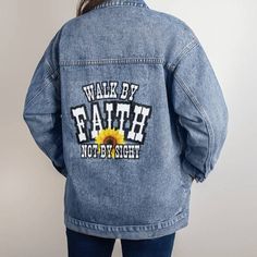 Walk By Faith Women's Denim Jacket - Sunflower | Inspirational Expressions Spring Denim Blue Outerwear With Letter Print, Fall Denim Outerwear With Letter Print, Oversized Denim Outerwear With Letter Print, Medium Wash Denim Jacket With Letter Print, Casual Denim Outerwear With Letter Print, Oversized Denim Jacket With Letter Print For Fall, Blue Denim Jacket With Letter Print, Spring Denim Outerwear With Letter Print, Trendy Denim Blue Jacket With Letter Print