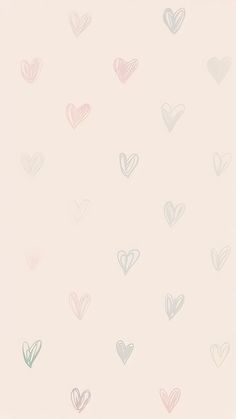 many hearts are drawn in pastel colors on a pink background