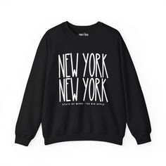 Elevate your urban style with our "New York New York Chic" Women's Sweatshirt, designed for those who appreciate the dynamic energy of the city that never sleeps. Embrace the essence of New York's iconic fashion scene while enjoying unparalleled cozy comfort. Crafted from premium materials, this sweatshirt is more than just a garment; it's a statement piece. The intricate design seamlessly integrates the bold "New York New York" lettering, showcasing your love for the city's vibrant spirit. The Trendy Winter T-shirt With Logo Print, Cozy Crew Neck Streetwear Top, Oversized Letter Print Sweatshirt For Urban Adventures, Urban Style Text Print Tops For Fall, Urban Tops With Text Print For Fall, Urban Text Print Tops For Fall, Urban Streetwear Slogan Sweatshirt, Winter Slogan Tops For Streetwear, Urban Winter Tops With Logo Print