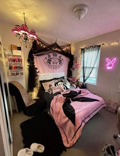 a bedroom decorated in pink and black with harry potter decorations on the walls, bedding, and rugs