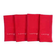 three red napkins with embroidered words on them