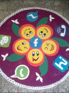 a colorful flower design on the ground with facebook and other social media icons around it