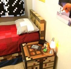 a bed room with a neatly made bed and a night stand