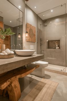 a bathroom with a sink, toilet and bathtub next to a walk in shower