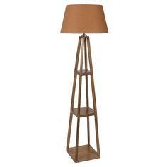 a wooden floor lamp with a brown shade