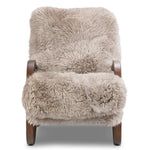 the chair is made from sheepskin and has wooden legs