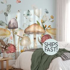 a bedroom with mushrooms painted on the wall and a sign that says ships fast in front of it