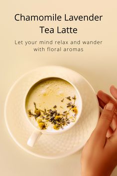 a person holding a cup of tea next to a plate with flowers on it and the words chamomile lavender tea latte