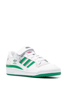 Forum 84 low-top sneakers from adidas featuring calf leather, signature monofilament side-stripe detail, logo print to the side, logo at the sole, panelled design, padded ankle, round toe, front touch-strap over lace-up fastening, branded insole, rubber sole and white/green. This item is in size 4 and the color is Sporty Green High-top Sneakers With Adidas Logo, Green Adidas High-top Lace-up Sneakers, Low-top Green Sneakers With Three Stripes Branding, Adidas Green Low-top Sneakers, Farfetch Adidas Sneakers, Adidas Forum Low, Forum Low, Adidas Forum, Top Sneakers Women