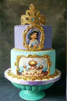 there is a three layer cake decorated with princesses