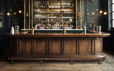 an old fashioned bar with lots of bottles on it