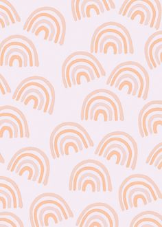 an orange and white pattern with rainbows on it