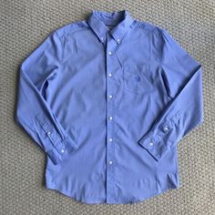 New With Tags. Size Medium. 64% Cotton, 32% Polyester, And 4% Elastane. Also Have This Button Up In A Teal Green Color In My Listings. Measurements Are 31" From Top Of Shoulder To Hem, Sleeves Are 25 1/2" Long, And Body Is 22 1/2" Wide Across Laying Flat. Blue Business Shirt With Pockets, Blue Cotton Dress Shirt With Pockets, Business Blue Shirt With Pockets, Blue Business Top With Button Closure, Casual Blue Button-up Dress Shirt, Classic Blue Shirt With Pockets, Blue Dress Shirt With Spread Collar And Button Closure, Formal Blue Tops With Pockets, Blue Button-up Business Top