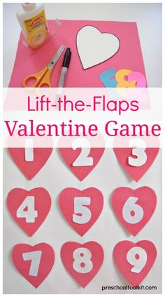 valentine's day game for kids with paper hearts, scissors and glue on the table