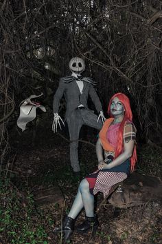 a woman sitting on top of a tree stump next to a creepy man in the woods